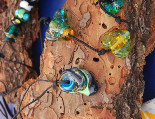 Glass Beads Displayed on Tree Bark